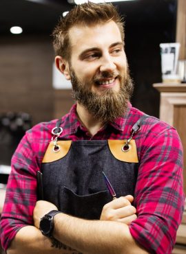 2man-having-a-haircut-with-a-hair-clippers-in-barbe-BPQA93R-2.jpg