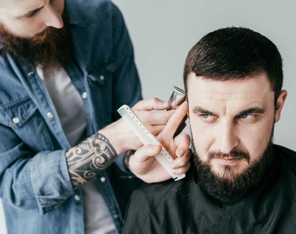 barber-shaving-customer-hair-with-shaving-machine-2022-12-16-18-01-42-utc-2.jpg