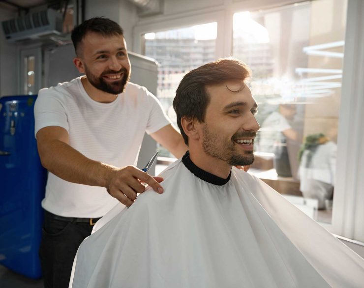 happy-male-client-of-hair-salon-looking-contented-2022-09-28-23-13-57-utc-2.jpg
